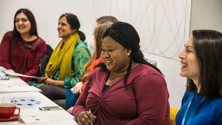 A group of people laughing.