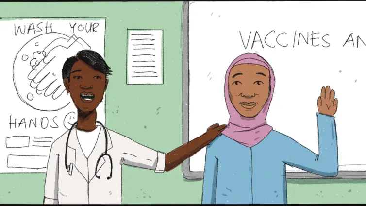 Two people with their backs to a white board with 'vaccines' written on it. One of the people is wearing a white lab coat and the other person is wearing a headscarf and a blue outfit.  a medical coat.